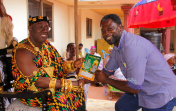 CEO- Alpha and Omega Publications Ltd in a photo with